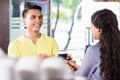 Male Customer paying for coffee with credit card Royalty Free Stock Photo