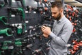 male customer in a power tool store Royalty Free Stock Photo