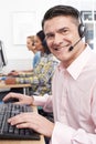 Male Customer Services Agent In Call Centre Royalty Free Stock Photo