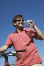 Male Cyclist Drinking Water