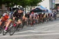Male Cyclist Leads Pack Into Turn In Amateur Bike Race Royalty Free Stock Photo