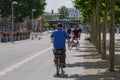 Male cyclist ride bicycle on bicycle lane.