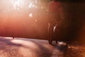 Male cyclist riding his bike on sunset on a road through deep woods. Extreme biker no safety equipment Royalty Free Stock Photo