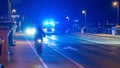 Male cyclist on a road at night in Frankfurt.