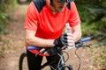 Male cyclist taking break during cycling Royalty Free Stock Photo