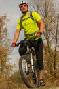 Male cyclist traveling with bike.