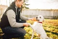 Male cynologist with trained working dog Royalty Free Stock Photo