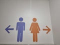 male and female symbols in front of the toilet Royalty Free Stock Photo