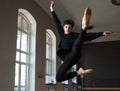 Male dancer jumping at gym Royalty Free Stock Photo