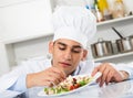 Male is degustating salad Royalty Free Stock Photo
