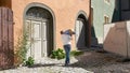 Man with super large cheese wheel in Rothenburg on the Romantic Road, Germany