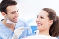 Male dentist and woman in dentistÃ¢â¬â¢s office Royalty Free Stock Photo