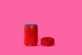 Male deodorant on a bright pink background