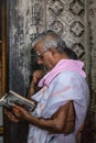 Male devotee during Abisheka ceremony for Devi Ranganayaki at Chennakeshava Temple in Belur, India