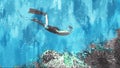 Male diver diving to see fish and corals under sea, aquatic land scape, digital painting illustration