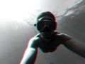 Male diver swims in sea under water with a mask and snorkel Royalty Free Stock Photo