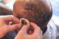 Male doctor applying hearing aid to senior man ear Royalty Free Stock Photo