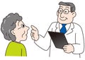 A doctor explaining to a middle-aged female patient using a tablet chart