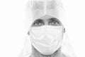 male doctor epidemiologist wearing respirator mask and safety protective costume during creating vaccine from