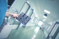 Male doctor examines the patient`s MRI picture in the hospital h Royalty Free Stock Photo