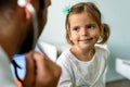 Male doctor examining a child patient in a hospital Royalty Free Stock Photo