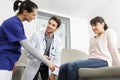 male doctor examining patient in room Royalty Free Stock Photo