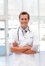 Male Doctor with Folded arms looking at camera Royalty Free Stock Photo