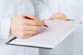 Male doctor hands holding cardiogram