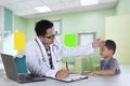 Male doctor with his patient in the clinic Royalty Free Stock Photo