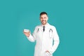 Male doctor holding card with word UROLOGY Royalty Free Stock Photo