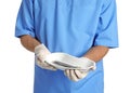 Male doctor holding dish with medical tools on white, closeup. Medical objects Royalty Free Stock Photo