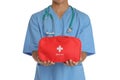 Male doctor holding first aid kit on white background, closeup. Royalty Free Stock Photo