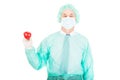 Male doctor holding heart model