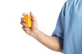Male doctor holding pill bottle on white background, closeup. Royalty Free Stock Photo