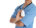 Male doctor holding pill bottle on white, closeup with space for text. Medical object Royalty Free Stock Photo