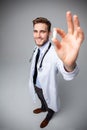A male Doctor holding pill medical health care pharmacy concept.