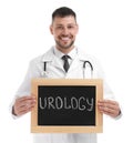 Male doctor holding small blackboard with word UROLOGY