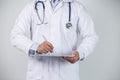 Male doctor using his digital tablet in the hospital Royalty Free Stock Photo