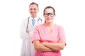 Male doctor with nurse standing with folded arms Royalty Free Stock Photo