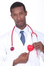 Male doctor with plastic heart