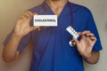 Male doctor prescribes prescription for pills cholesterol Royalty Free Stock Photo