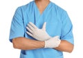 Male doctor putting on rubber gloves against white. Medical object Royalty Free Stock Photo