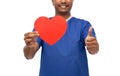 male doctor with red heart showing thumbs up Royalty Free Stock Photo