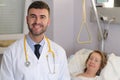 Male doctor smiling at work Royalty Free Stock Photo