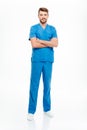 Male doctor standing with arms folded Royalty Free Stock Photo