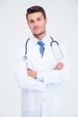 Male doctor standing with arms folded Royalty Free Stock Photo