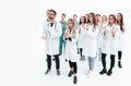 Male doctor standing in front of a group of medical students.