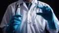 A male doctor stands holding a vaccine against coronavirus infection