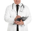 Male doctor with stethoscope and clipboard, closeup. Medical staff