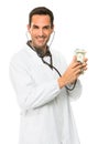 male doctor with stethoscope on money Royalty Free Stock Photo